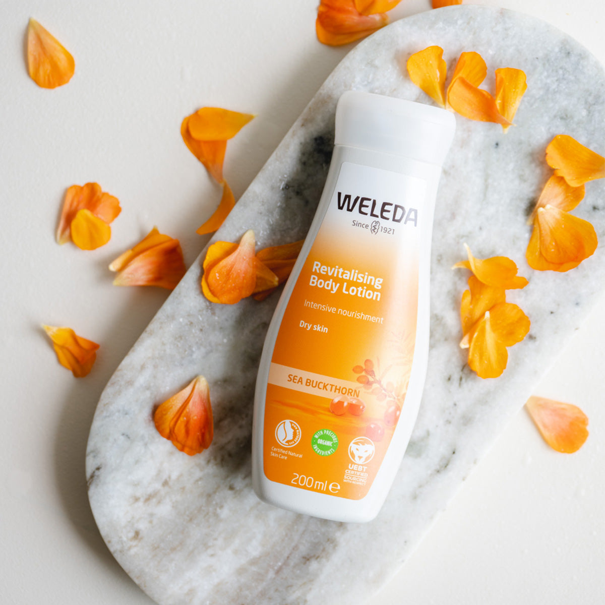 Weleda Body Lotion Revitalising Sea Buckthorn | 200 ml fra Weleda på Mecindo.dk